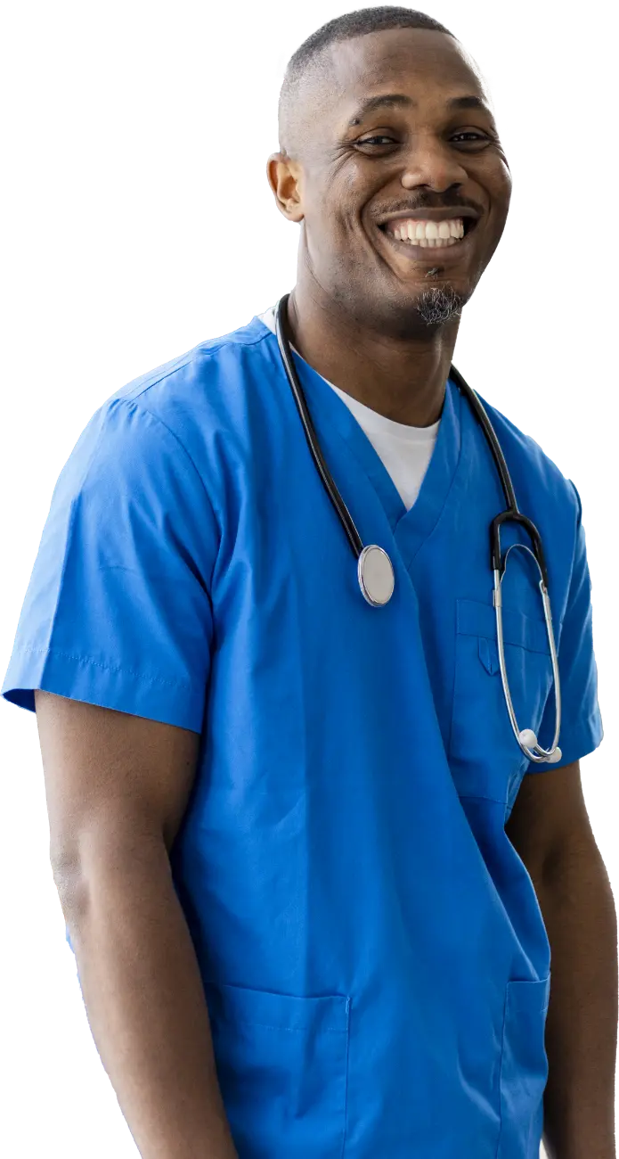 male dr standing in scrubs